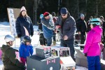 Kids and adults with homemade sleds, the Festival of Outdoor Rinks, Whitney