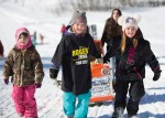 A group of kids with a homemade sled, the Festival of Outdoor Rinks, Whitney