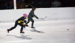 Two kids playing hockey in the Township of South Algonquin