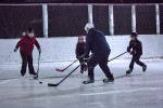 A family playing hockey
